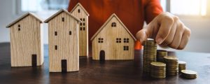 Affordable housing Australia: stacked coins & model homes guide for Korean community