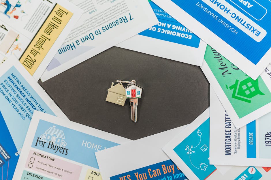 Australian housing market: Labour government policy & real estate brochures, house key.