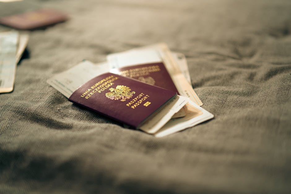 Australian immigration security: Polish passport & travel docs on fabric, symbolizing identity.