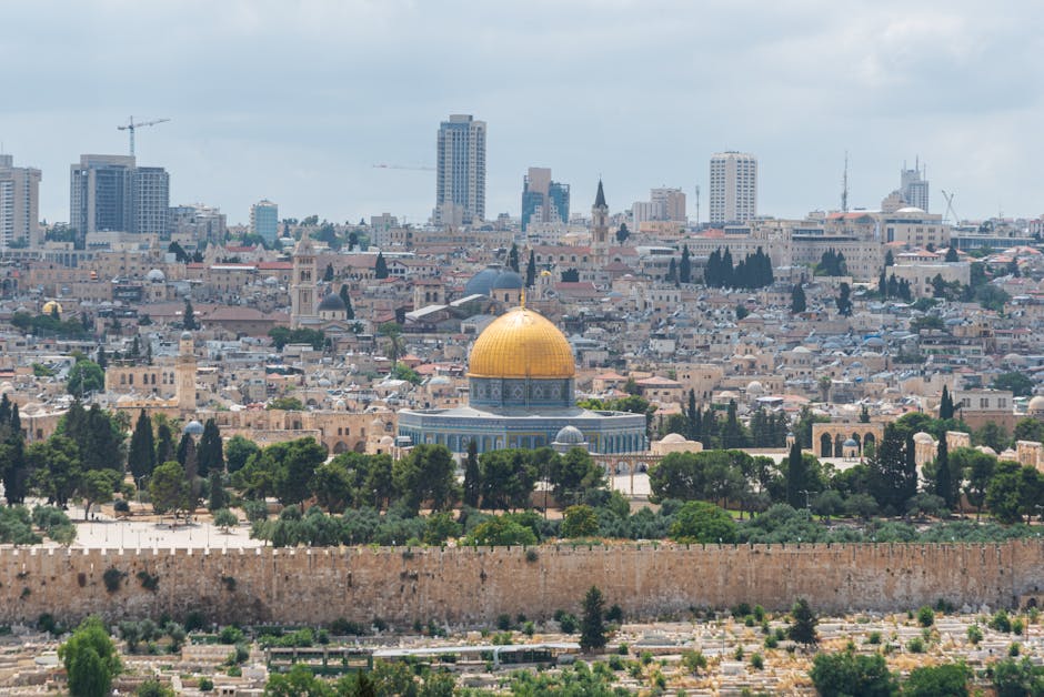 Israel's Dome of the Rock, Jerusalem skyline aerial view. Humanitarian expulsion debate relevant to Australia.