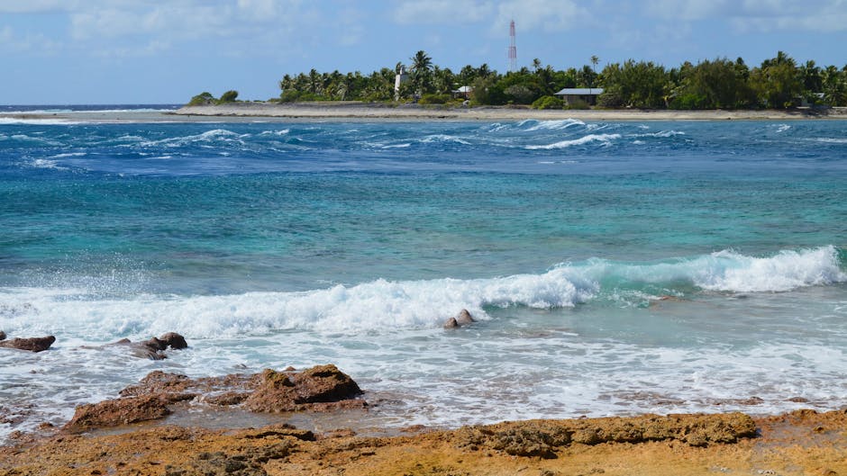 Nauru deal: Vibrant tropical beach, Australian asylum seeker policy, human rights.