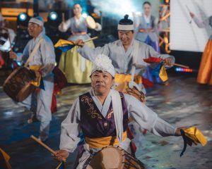 Vibrant display of Korean traditional dance with performers in cultural attire, Jakarta.