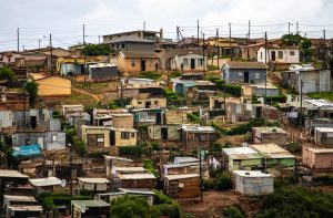 Captivating aerial photo showcasing a densely packed informal housing settlement.