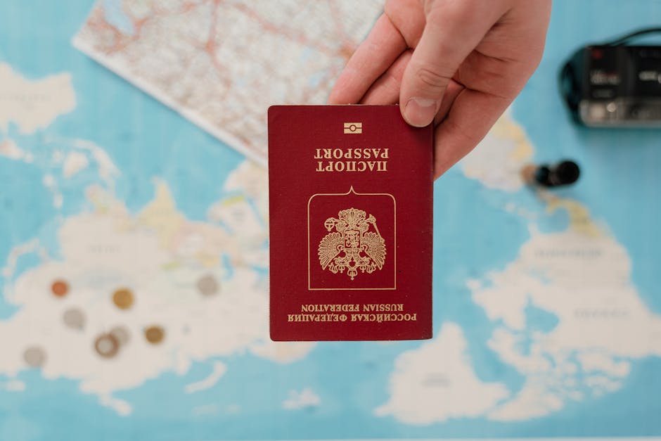 Australian tech visa opportunities: Hand with passport over map, AI industry growth