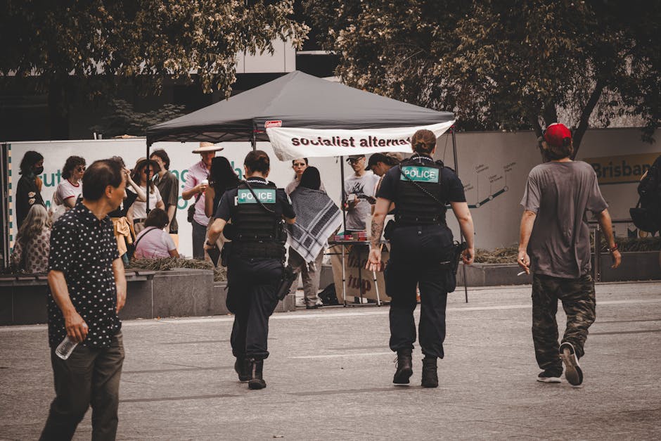 Police officers monitoring a protest in Brisbane City, Australia.